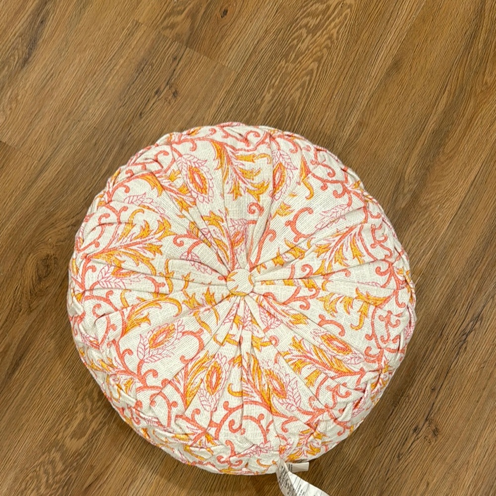 Round Cushion with Pink and Orange Floral Design
